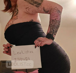 Escorts Edmonton, Alberta Busty Redhead With Split Tongue